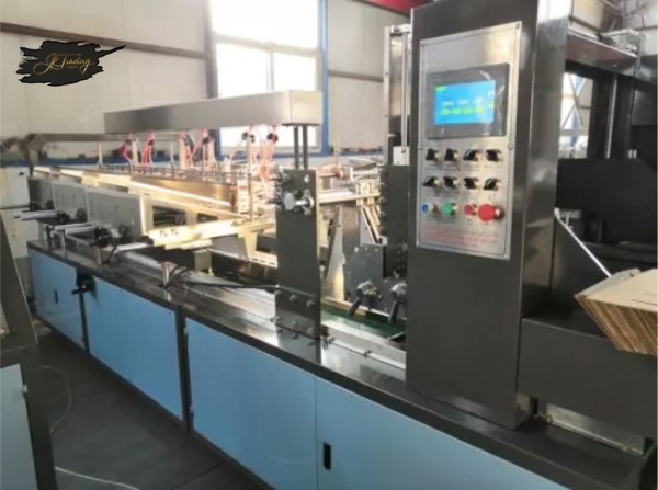 Automatic corrugated cardboard partition assembler machine